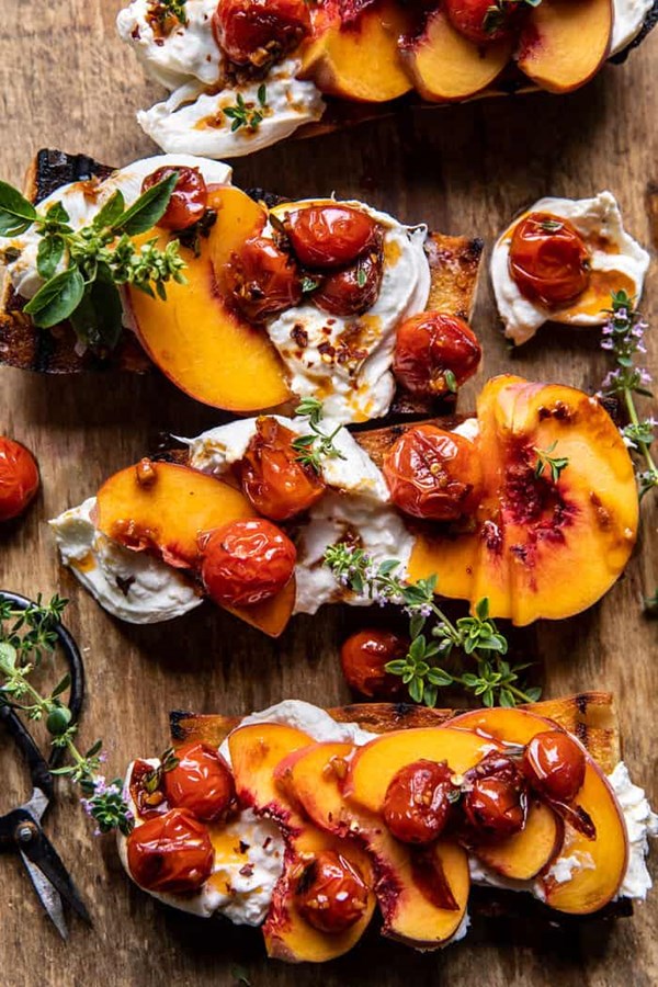 Peach burrata crostini with burst cherry tomato vinaigrette