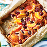 Peach, cherry and almond cake with elderflower drizzle