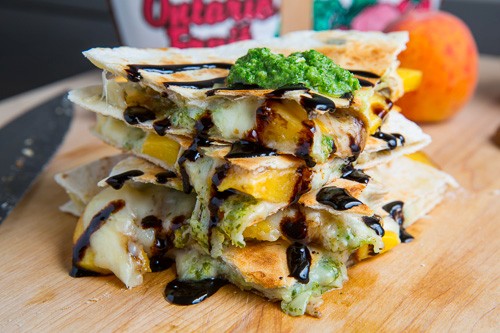 Peach, chicken and Gorgonzola balsamic quesadillas with arugula pesto