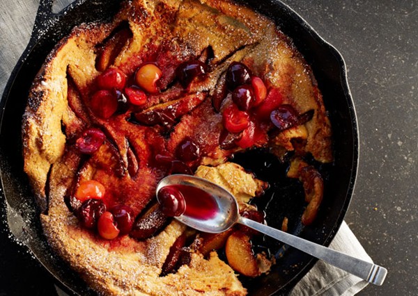 Peach Dutch baby pancake with cherry compote