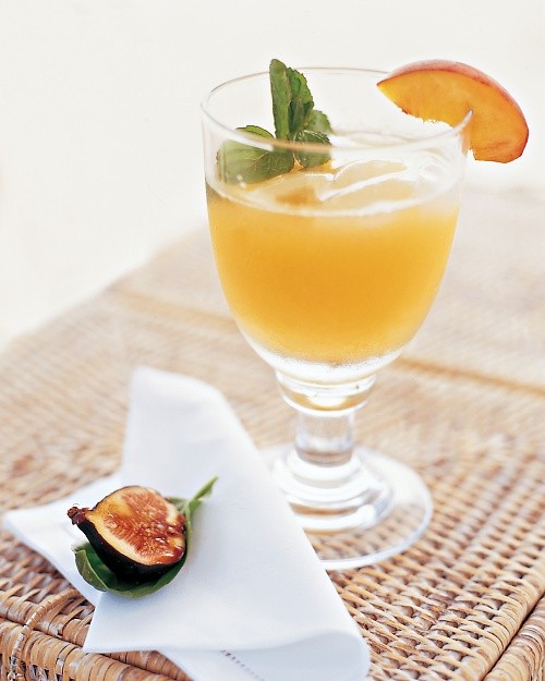 Peach margaritas with peach wedges