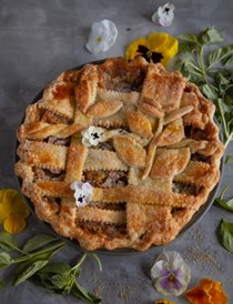 Peach, rhubarb, and basil pie