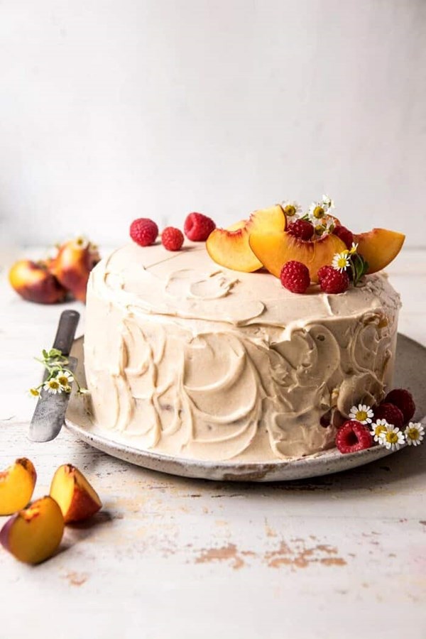 Peach ricotta layer cake with browned butter buttercream