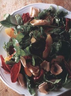 Peach, rocket and mixed leaf salad with rose petals and rose water dressing