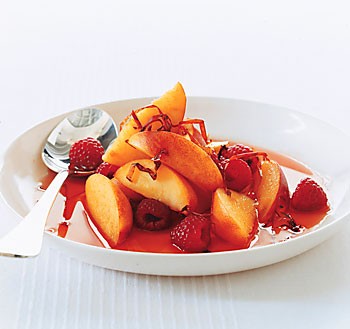 Peaches and raspberries in ancho syrup with chile threads