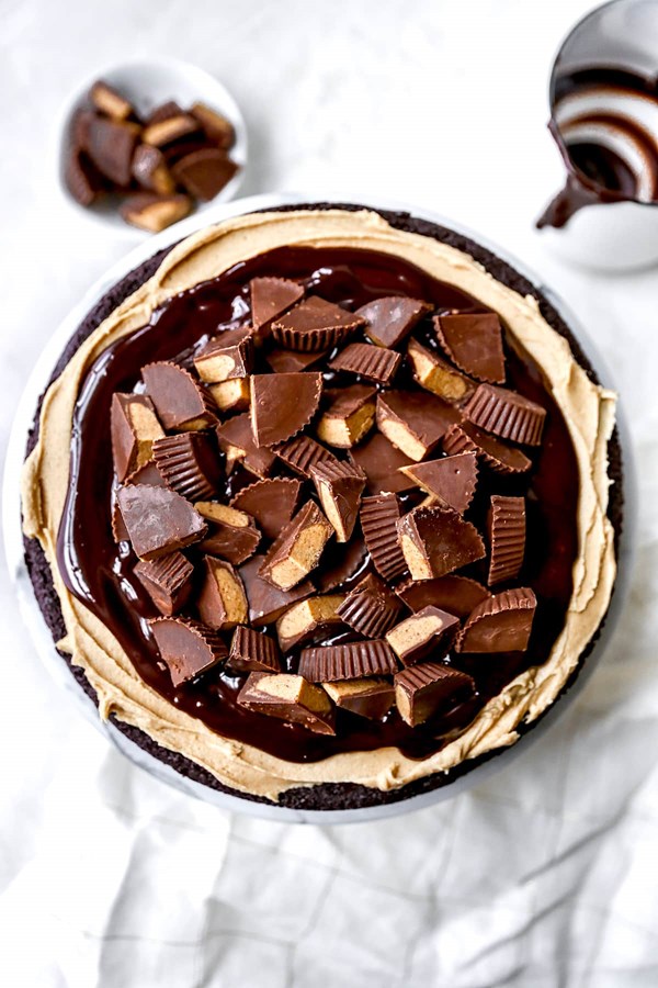 Peanut butter flourless chocolate cake [peanut butter frosting, chocolate ganache]