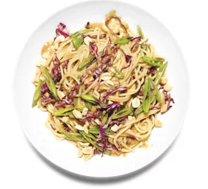 Peanut noodles with snap peas and cabbage