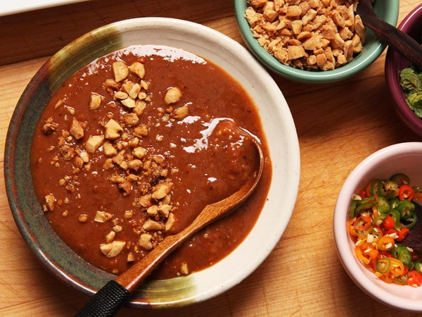 Peanut-tamarind dipping sauce for spring rolls or satay