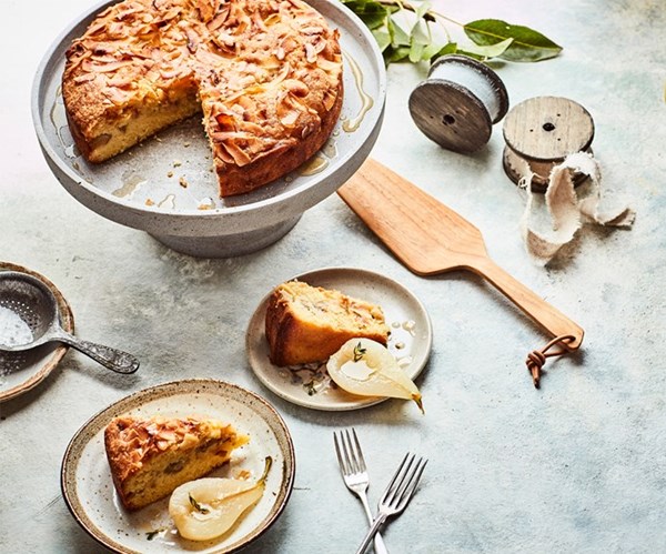 Pear & toasted coconut cake with honey & thyme poached pears