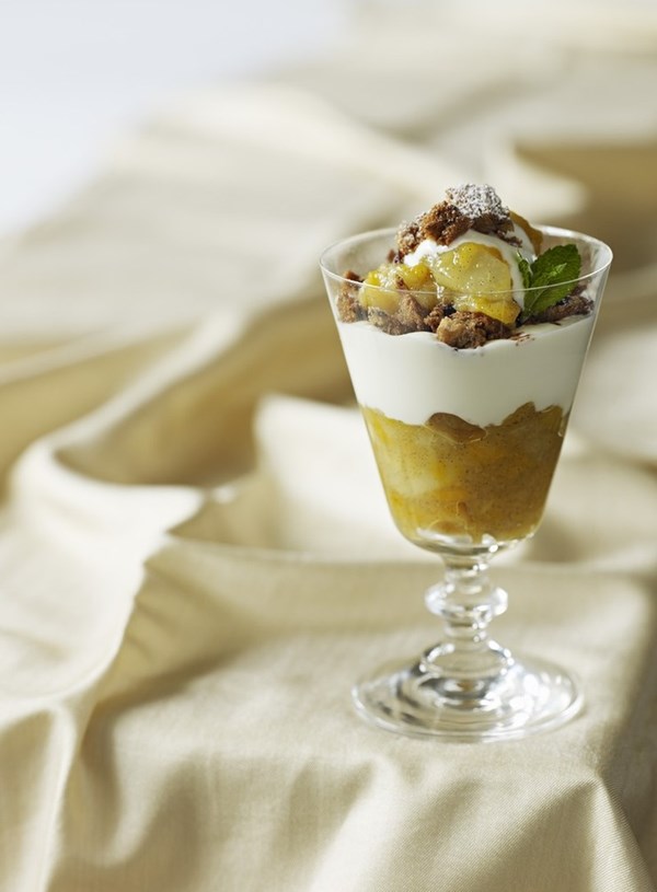 Pear and apricot compote with fruit bread crumble