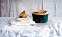 Pear and Poire William souffle with chocolate sauce