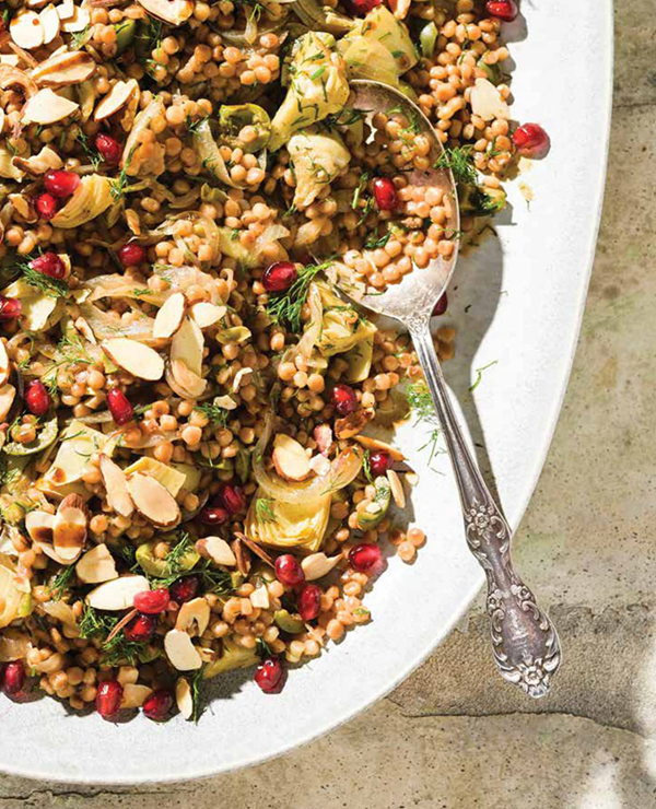 Pearl couscous pilaf with artichokes, green olives and dill