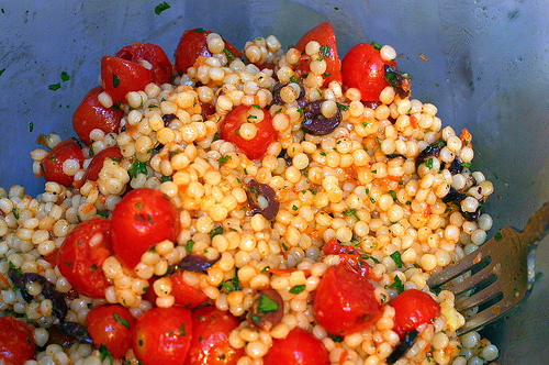 Pearl couscous with olives and roasted tomatoes