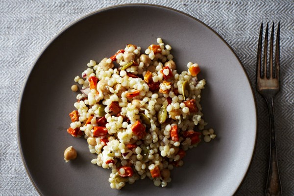Pearl couscous with roasty roots, chickpeas, and pepitas
