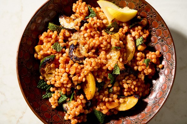 Pearl couscous with zucchini, garlic and mint