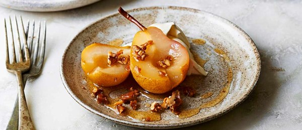 Pears poached in perry with Chantilly cream and candied walnuts