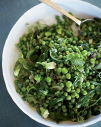 Peas and pea shoots with spring onions and mint