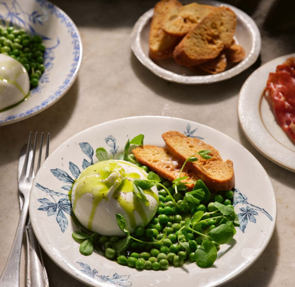 Peas with burrata and herb oil