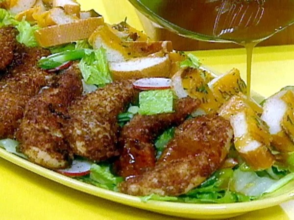 Pecan crusted chicken tenders and salad with tangy maple dressing 