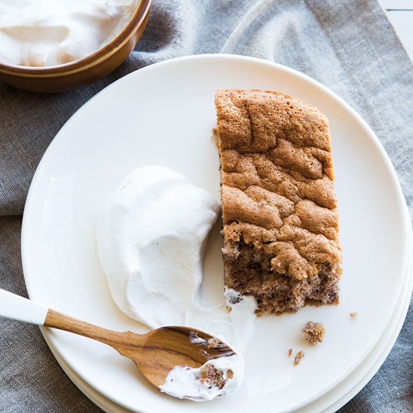 Pecan torte with bourbon whipped cream