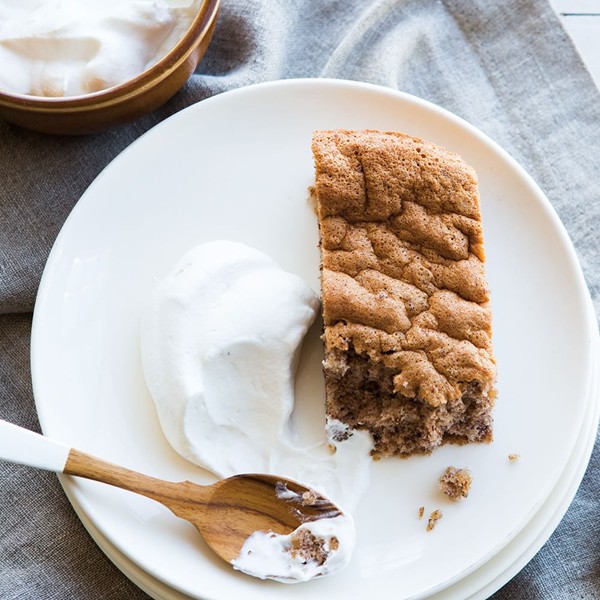 Pecan torte with bourbon whipped cream
