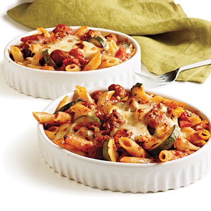 Penne rigate with spicy sausage and zucchini in tomato cream sauce