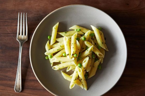 Penne with herb butter and peas