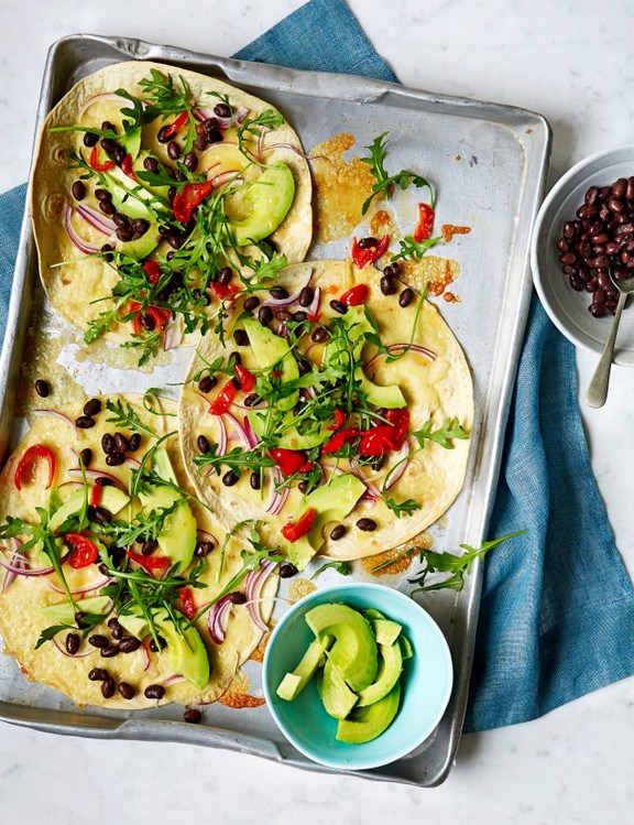 Peppadew, black bean and avo tortilla pizzas