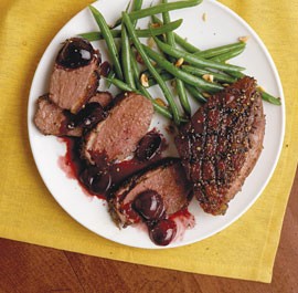 Pepper-crusted duck breasts with cherry-Port sauce