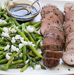 Pepper-crusted pork tenderloin with asparagus and goat cheese