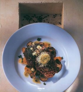 Pepper-crusted rib-eye steaks with Roquefort butter, sautéed potatoes & porcini