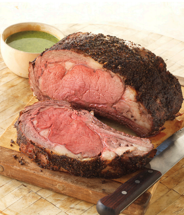 Pepper-crusted rib roast with three-herb hazelnut pesto