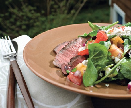 Pepper-grilled steak with chopped summer salad