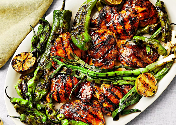 Pepper jelly-glazed chicken thighs with grilled peppers