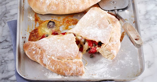Pepper, olive and caper calzones