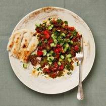 Pepper salad with cucumber and herbs