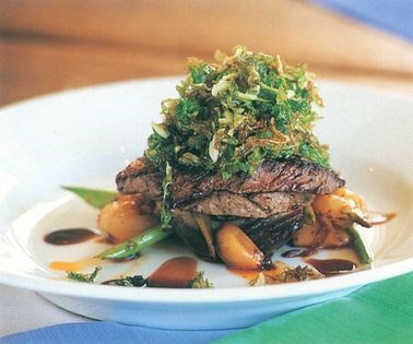 Peppered minute steak with chilli roasted onions and deep-fried cabbage