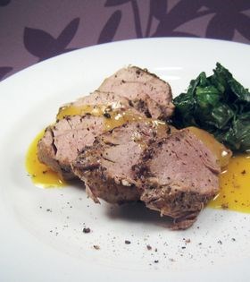 Peppered pork fillet with orange and garlic jus