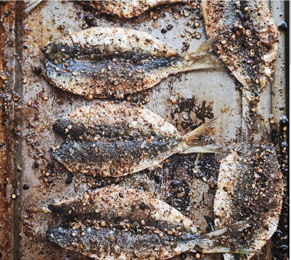 Peppered sardines with a green olive sauce