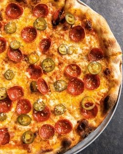 Pepperoni and pickled chile pizza