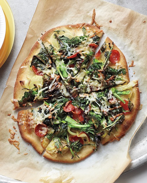 Pepperoni, potato, and broccoli rabe pizzas