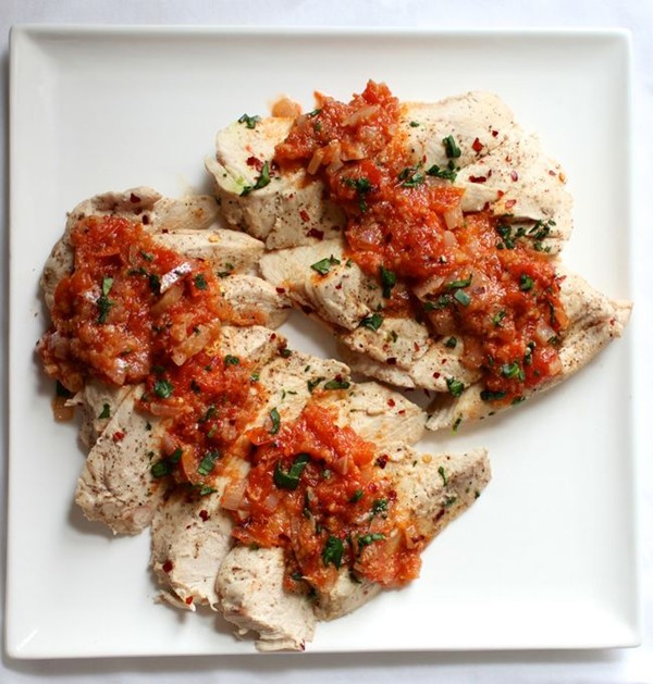 Perfect poached chicken breasts with warm tomato-ginger vinaigrette