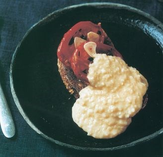 Perfect scrambled eggs with tomatoes on toast