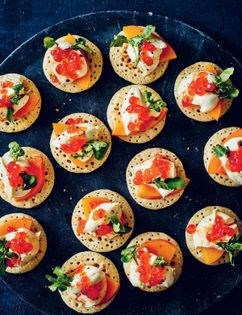 Persimmon and salmon roe blinis