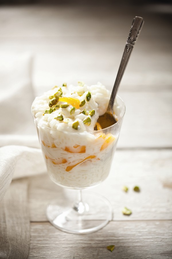 Persimmon, pistachio, and coconut rice pudding parfaits