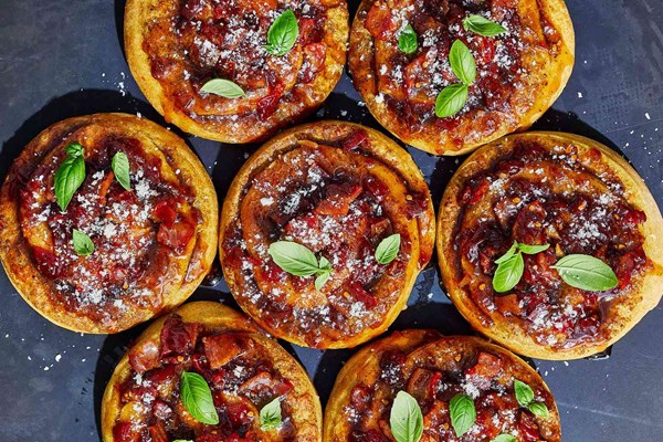 Pesto-and-cheese-stuffed brioche scrolls with bacon-tomato jam