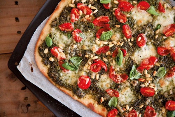 Pesto and cherry tomato pizza