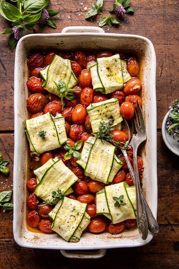 Pesto cheese zucchini ravioli with burst tomatoes