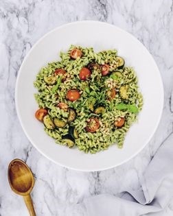 Pesto fusilli with zucchini and toasted pine nuts