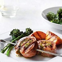 Pesto-pork pinwheels with grilled peaches